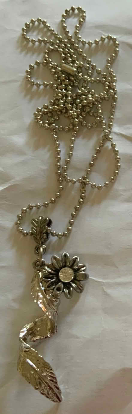 Photo of free Long Silver coloured flower & leaf necklace (Stanstead St Margarets SG12) #1