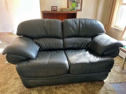 Photo of free Leather Loveseat (Milford MI) #1