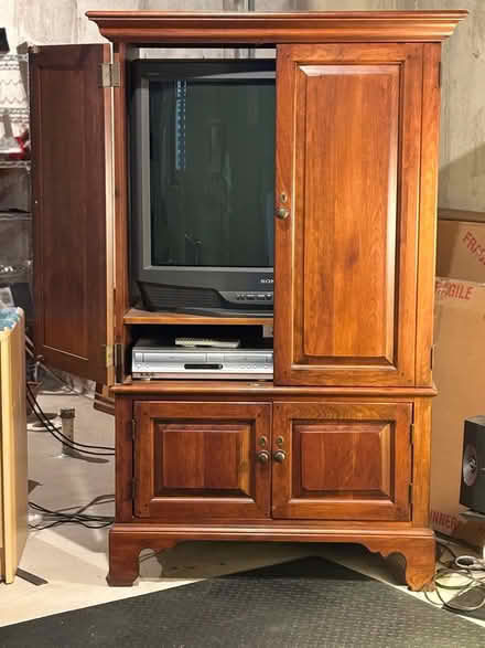 Photo of free Solid wood cabinet + 36” Sony TV (Littleton) #1