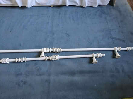 Photo of free White wooden curtain poles x2 (Llansantffraid SY22) #1