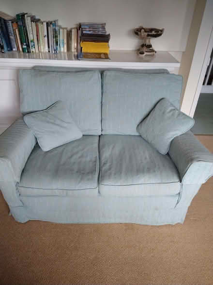 Photo of free Pale turquoise/blue two seater sofa (Raveningham NR14) #1