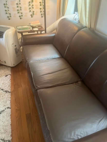 Photo of free Brown Faux-Leather Pullout Couch (60642) #2