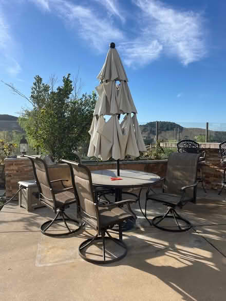 Photo of free Patio table set with umbrella (Talega) #1