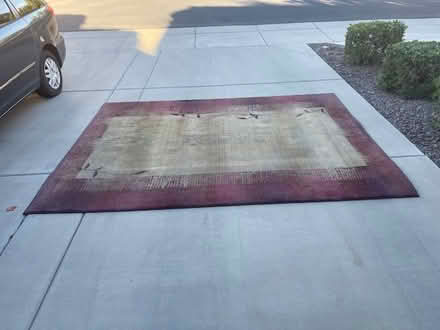 Photo of free Rug -- with a small damaged area (Near Riggs and Cooper) #1