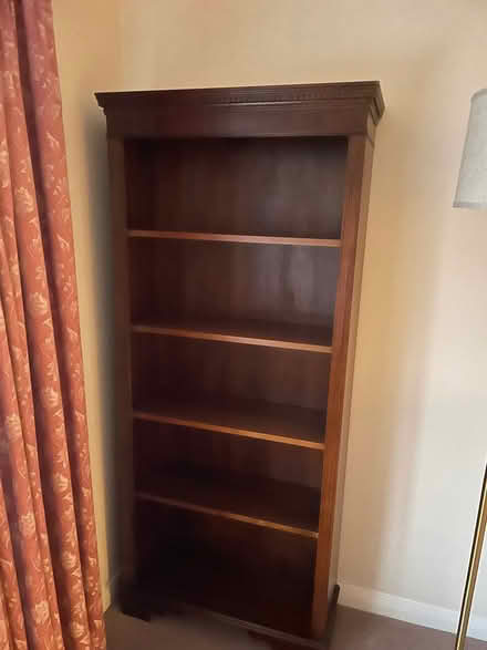 Photo of free Tall bookcase mahogany (Noctorum CH43) #1