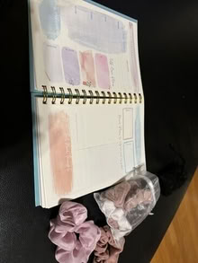 Photo of free notebook and hair scrunchy #1