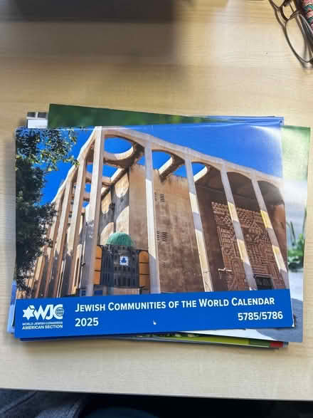 Photo of free 2025 calendars and a crossword (Albany on Solano) #3