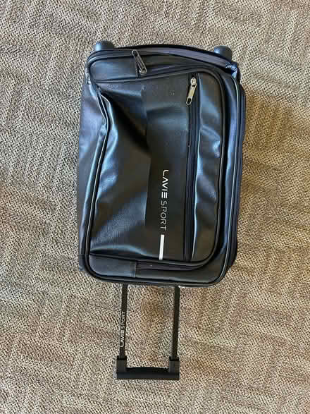 Photo of free Small black rolling suitcase (Valencia Avenue, Sunnyvale) #1