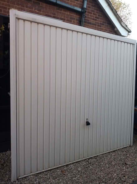 Photo of free Garage door (Woodston) #1