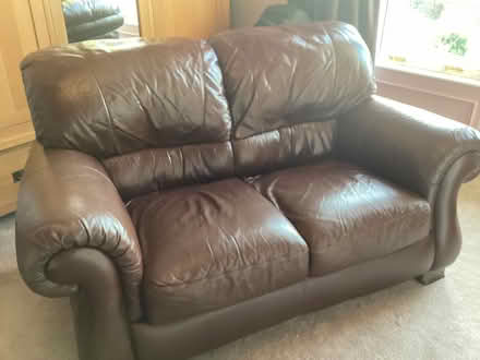 Photo of free Brown Moreno leather two seater settee (Helensburgh G84) #1