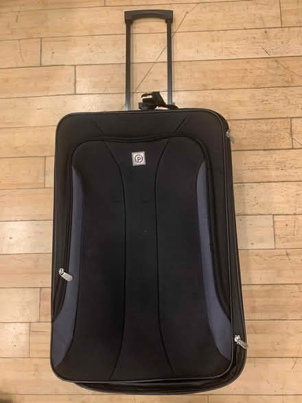 Photo of free Black Suitcase (Repost (Brooklyn Storage) #2