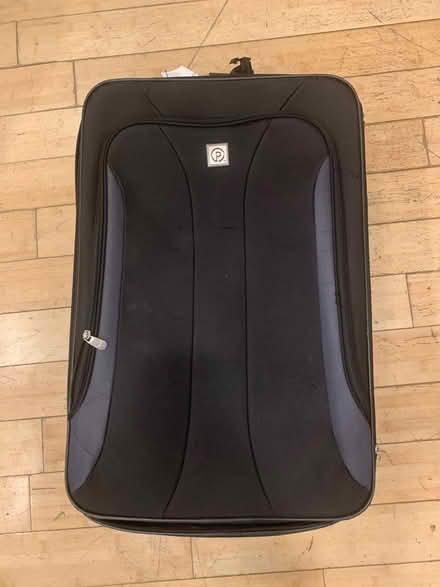 Photo of free Black Suitcase (Repost (Brooklyn Storage) #1