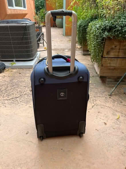 Photo of free Rolling suitcase (Saratoga Herriman Ave) #2