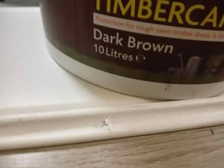 Photo of free Half a tub of dark brown fence paint (Saint Andrew Auckland DL14) #1