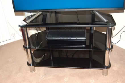 Photo of free Black glass tv stand (Stamperland G76) #1