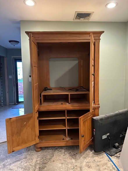 Photo of free Tall wooden tv/storage cabinet (Deer Park NY) #3