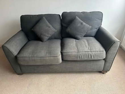 Photo of free black 2 seater sofa (SW15 2AS) #1