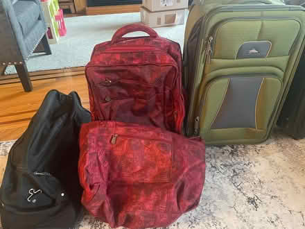 Photo of free Assorted suitcases (388 Hewlett Pkwy, Hewlett, NY) #1