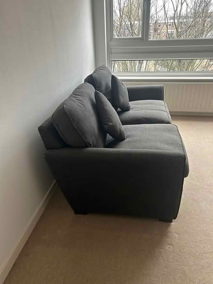 Photo of free black 2 seater sofa (SW15 2AS) #3