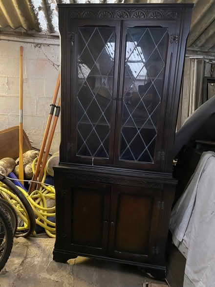 Photo of free Dark oak corner cupboard (Thorpe le soken) #1