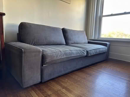 Photo of free Grey couch/futon (Brooklyn Heights) #1