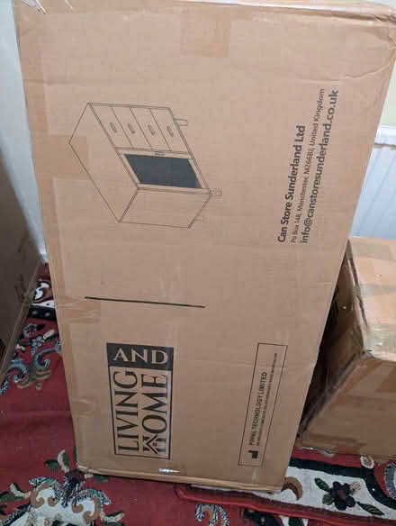 Photo of free Unassembled Side Board with instructions inside. (Westone) #1