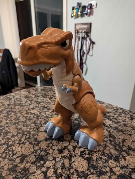 Photo of free Battery Powered Toy T-Rex (Oxbow Lk and Elizabeth Lk Rds) #1