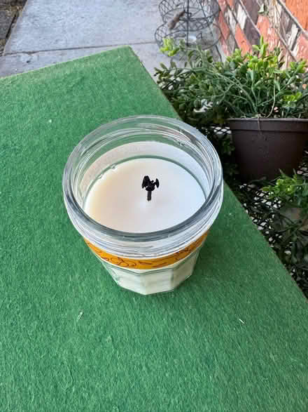 Photo of free Partially used Apple scented candle (Wyoming NE & Comanche Rd NE) #1