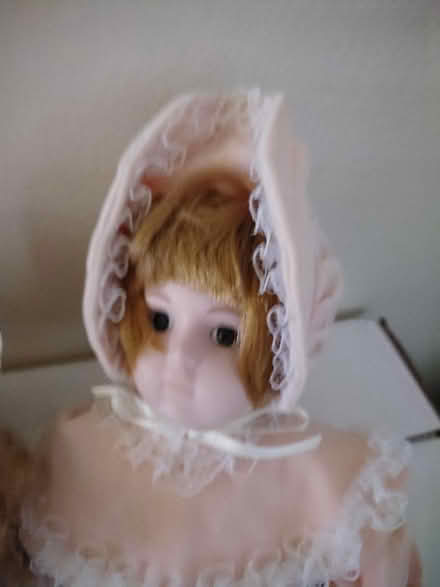 Photo of free 2 porcelain dolls & stand (~12 in) (highway 10 & wanless drive) #1