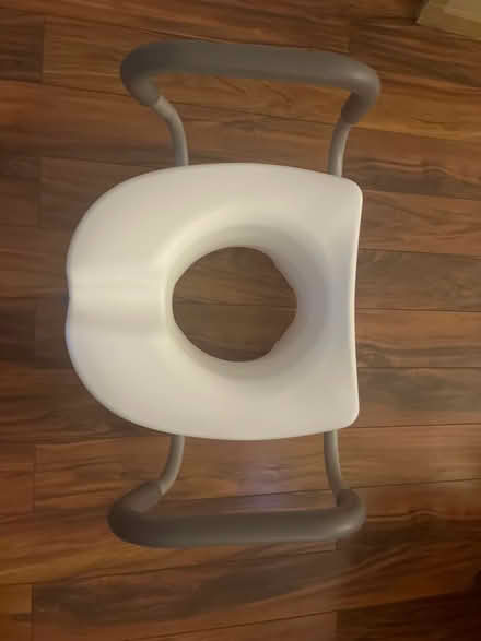 Photo of free Toilet seat riser/extender (Southeast commons) #1