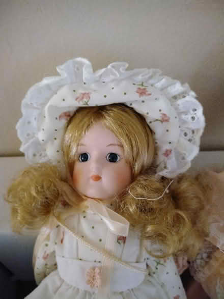 Photo of free 2 porcelain dolls & stand (~12 in) (highway 10 & wanless drive) #2