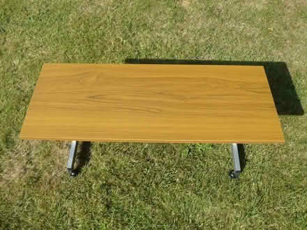 Photo of free Teak effect TV/side/coffee table on castors (Kempsey WR5) #2