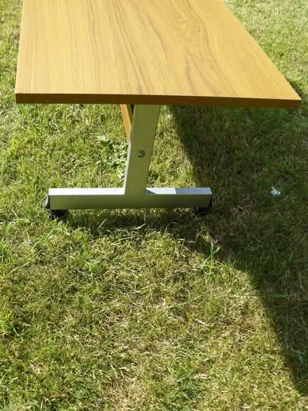 Photo of free Teak effect TV/side/coffee table on castors (Kempsey WR5) #3