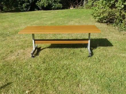 Photo of free Teak effect TV/side/coffee table on castors (Kempsey WR5) #1