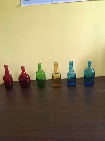 Photo of free Six small colored-glass bottles (Landings, in Burke) #1