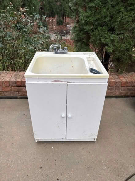 Photo of free Laundry utility Sink and cabinet (6969 Brandi Wood Cir) #1