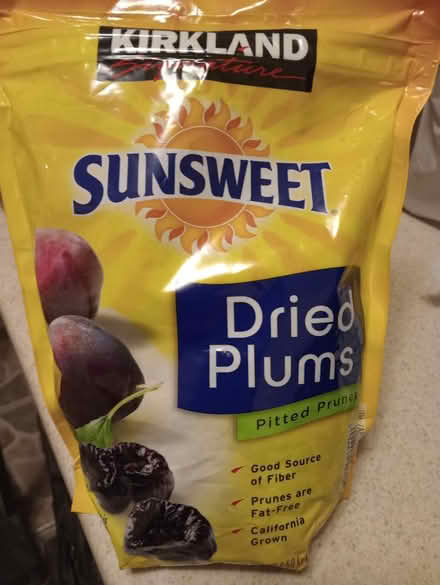 Photo of free prunes, avon bottle, gas container (55th & Main) #1