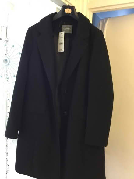 Photo of free Black coat (SG1) #2