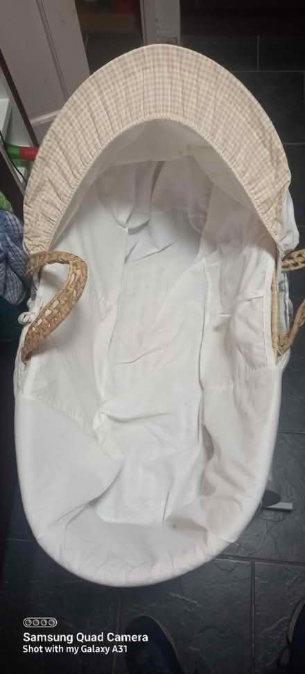 Photo of free Moses basket on rocking stand (RG22 Brighton Hill) #1