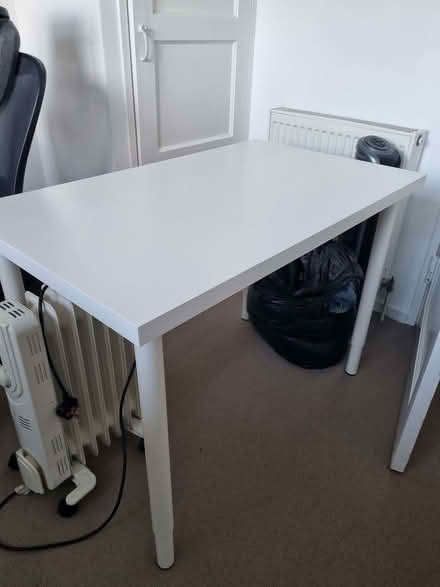 Photo of free Ikea Desk in good condition with adjustable height legs (Fulham Palace Rd W6) #1