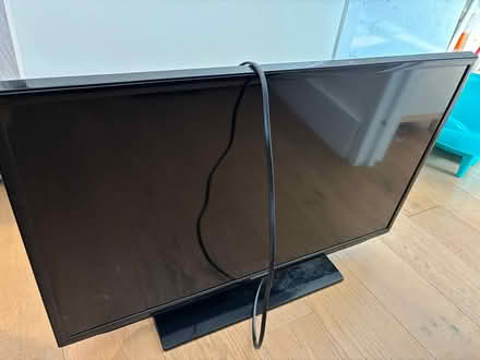 Photo of free Old TV with antenna and remote (Long Island City) #1