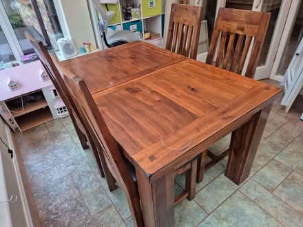 Photo of free Dark brown 'Elba' extending dining table with four chairs (Berkhamsted HP4) #2