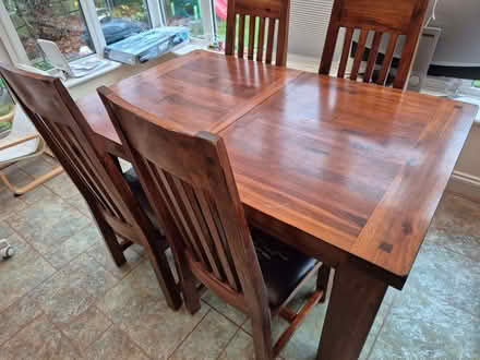 Photo of free Dark brown 'Elba' extending dining table with four chairs (Berkhamsted HP4) #3