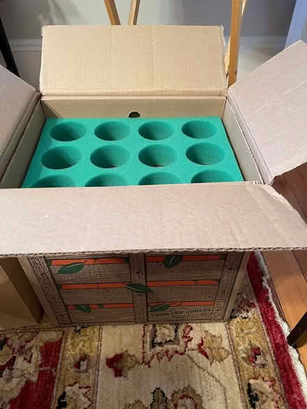 Photo of free oranges box with padding (Davis Sq) #1