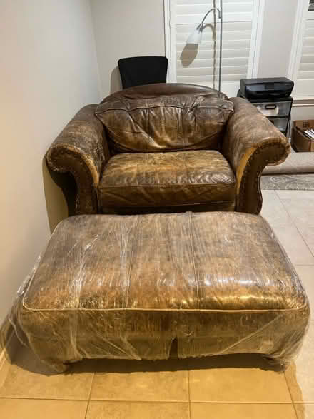 Photo of free Leather sofa chair with ottoman (Museum District - 77004) #1