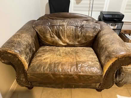 Photo of free Leather sofa chair with ottoman (Museum District - 77004) #2