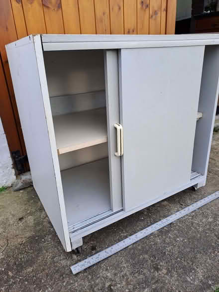 Photo of free Low cabinet with sliding doors and casters (Pentre Berw LL60) #3