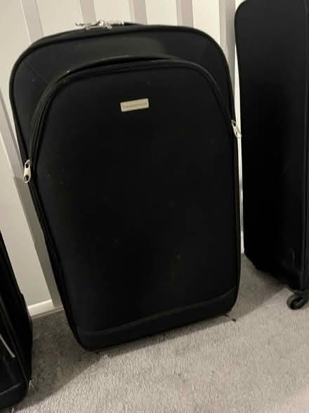 Photo of free Various sized suitcases (Moreton) #3