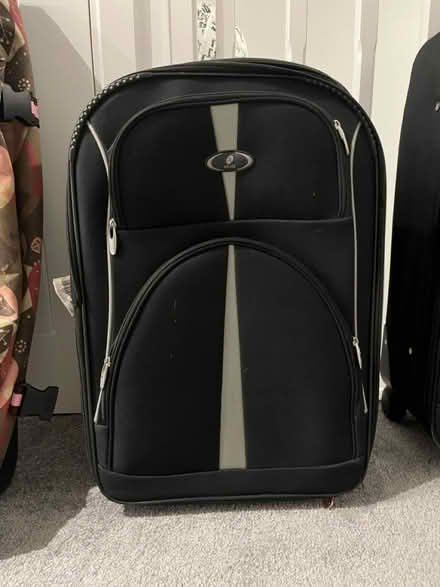 Photo of free Various sized suitcases (Moreton) #4