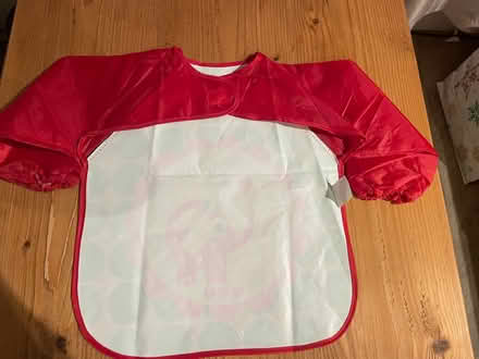 Photo of free Red & Green weaning bib (201 Streatham High Road) #2